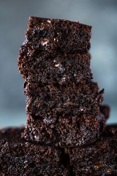 chocolate brownies stacked on top of each other