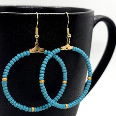 Turquoise and Gold Beaded Hoop Earrings - Boho Chic Statement Jewelry. Add a touch of boho elegance with these turquoise and gold beaded hoop earrings. Lightweight and versatile, they're perfect for everyday wear or special occasions. Turquoise and golden seed beads with fishhook earrings.  b Fishhook Earrings, Earrings Boho Chic, Turquoise And Gold, Fish Hook Earrings, Wedding Jewelry Earrings, Beaded Hoop Earrings, Beaded Hoops, Earrings Boho, Wedding Earrings