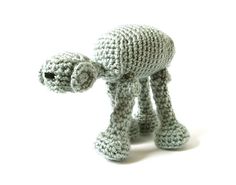 a crocheted toy is shown on a white background