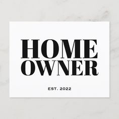 a black and white print with the words home owner on it, sitting on a marble surface