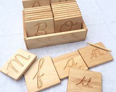 wooden blocks with numbers and letters on them