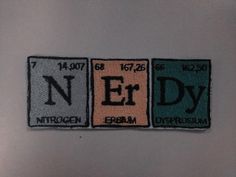 the name nerdy is written in three different colors on a metal surface with magnets