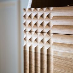 a close up view of some wood blinds