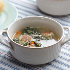 a bowl of soup with meat and vegetables