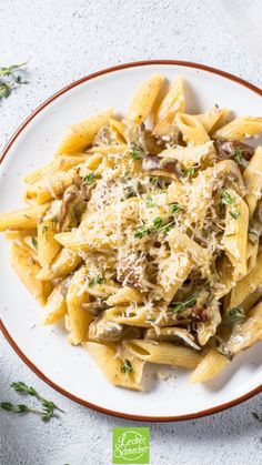 pasta with mushrooms and parmesan cheese on a plate