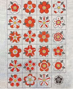 an old quilt with red and white flowers on it's sides, in squares