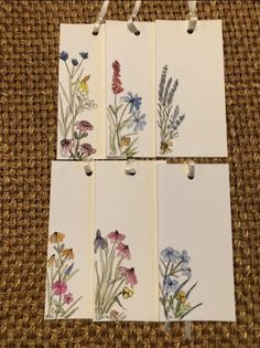 four small cards with flowers on them