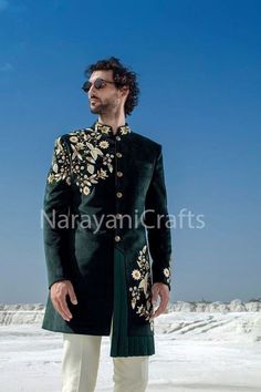 Product Description - The first and most important rule of men's style is you should feel comfortable and confident in your clothes. You will need both these attributes to pull off just about any outfit successfully. A suit that fits increases your confidence and makes you look good. Regardless of how 'classy' or expensive they might be. New Stylish handmade Decent Sherwani for men for wedding and festive occasions.  Stylish New Ethnic Sherwani for men Top Details  -  Color  -  Bottle Green Fabric  - Valvet Bottom Details - Color  - White Fabric - Cotton Bottom Style  -  Pant pajama (Free size) Note 1 :- If you want any other Color in this so please send us a message sothat we will make it according to your choice. Note 2:-  Select your size according to your chest. Note 3 :- If you want i Men Engagement Outfit Indian, Embroidered Sherwani For Groom In Transitional Season, Transitional Embroidered Sherwani For Groom, Embroidered Kurta For Groom In Transitional Season, Embroidered Sherwani For Groom, Traditional Embroidered Wear For Groom, Traditional Embroidered Groom Wear, Traditional Embroidered Bandhgala For Groom, Green Traditional Wear For Groom