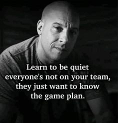 a man sitting in front of a black and white photo with the words learn to be quiet everyone's not on your team, they just want to know the game plan