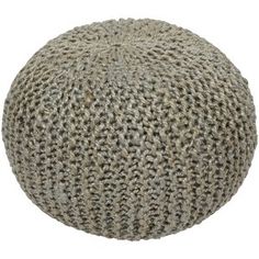 a round knitted poufle on a white background