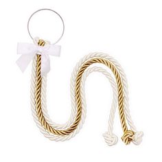 a white and gold rope with a bow on it