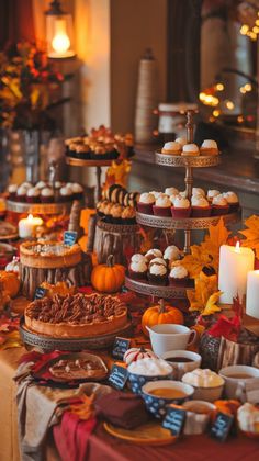 a table filled with lots of different types of desserts and pastries on it