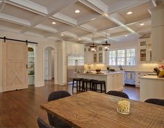 a large open kitchen and dining room area