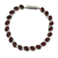 Twenty-one splendid carats of rich red garnet the birthstone of January create a scarlet ribbon to adorn the wrist. India's Alok Jain presents this sumptuous tennis bracelet featuring oval-faceted natural garnet stones set in sterling silver..925 Sterling silver Elegant Red Round Bracelets, Ruby Gemstone Tennis Bracelet, Red Round Tennis Bracelet For Formal Occasions, Oval Ruby Gemstone Tennis Bracelet, Formal Garnet Jewelry With Round Stone, Classic Faceted Round Bracelets, Red Oval Tennis Bracelet For Anniversary, Red Oval Gemstone Bracelet, Elegant Red Oval Bracelets