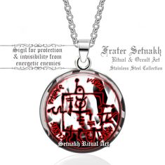 a red and black necklace with the words beneath it