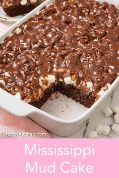 a close up of a cake in a pan with the words mississippi mud cake on it