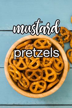 pretzels in a bowl with the words mustarded pretzels above them