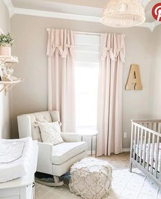 a baby's room with a crib, rocking chair and large window in the corner