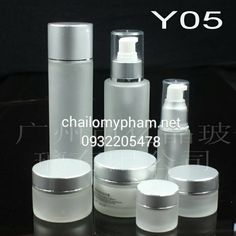 the bottles are all different sizes and have white caps on each one, which is also labeled yo5