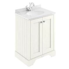 a white sink and cabinet on a white background