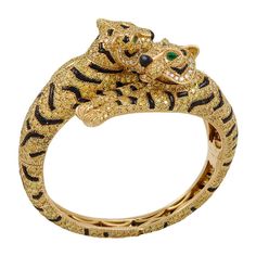 CARTIER Fancy Yellow Diamond, Onyx and Emerald Two Headed Tiger Bangle | From a unique collection of vintage bangles at http://www.1stdibs.com/jewelry/bracelets/bangles/ Cartier Tiger, Cartier Emerald, Animal Bracelets, Cartier Bangle, Most Expensive Jewelry, Tiger Jewelry, Modern Bangle, Tiger Love, David Webb