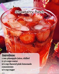 strawberry punch recipe in a glass with ice and strawberries