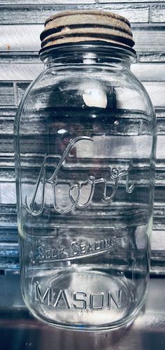 a mason jar sitting on top of a table