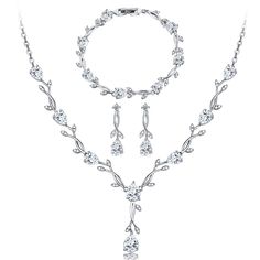 PRICES MAY VARY. 💎 Fabulous Design: Each carefully crafted cubic zirconia has multiple planes, which will refract very dazzling luster under the lights. Wearing this necklace earring bracelet set, matching with your elegant dress, the brilliant CZ will make you luxury and gorgeous in any occasions 💎 High Quality Material: This flower wedding jewelry set for bride is made of 14K white gold plated and crystal cubic zirconia. The size of this drop dangle earring is 2.7cm * 0.6cm. The necklace & b Silver Jewelry Bridesmaid, Choker Necklace For Wedding, Jewelry For V Neck Wedding Dress, Wedding Dress And Jewelry, Wedding Jewelry For Bridesmaids, Wedding Silver Jewelry, Silver Hoco Jewelry, Wedding Day Jewelry Brides, Simple Wedding Jewelry Sets