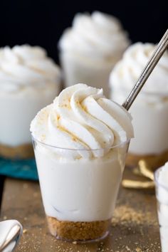 small desserts with whipped cream in glass cups