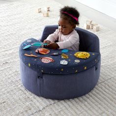 With our Deep Space Baby Activity Chair in your orbit, playtime is always ready for liftoff. The chair's removable tray has plenty to keep curious cadets active and stimulated, from a mirror and rattle to squeakers. A cotton seat makes for comfy voyages through the imaginary cosmos, while the stellar, space-themed designs by Michelle Romo are a real blast.    Activity chair should only be used on the floor and never placed on a table, chair or any other surface   Use only under adult supervision Baby Activity Chair, Infant Activity, Activity Chair, Gender Neutral Baby Shower Gifts, Baby Activity, Baby Chair, Pet Shop Boys, Space Baby, Cool Baby