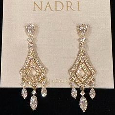 Nadri Cubic Zirconia Crystal Chandelier Earrings 18k Gold Plated 2" Drop Post Backs Rhodium-Plated Or 18k Goldplated Brass; Cubic Zirconia; Crystal Surgical Steel Posts Gold Crystal Drop Earrings, Quince Earrings Gold, Diamond Cut Cubic Zirconia Chandelier Dangle Earrings, Diamond Cut Cubic Zirconia Chandelier Earrings, Dangle Chandelier Earrings With Diamond Cut Cubic Zirconia, Elegant Teardrop Diamond Cut Chandelier Earrings, Elegant Chandelier Earrings With Diamond Cut Cubic Zirconia, Elegant Cubic Zirconia Chandelier Earrings With Diamond Cut, Elegant Diamond Cut Cubic Zirconia Chandelier Earrings