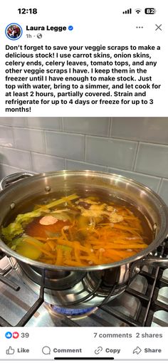 a pan filled with soup sitting on top of a stove next to a white tile wall