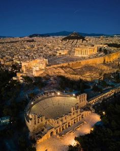 an aerial view of the ancient roman city of ephesia at night, with ruins in the foreground