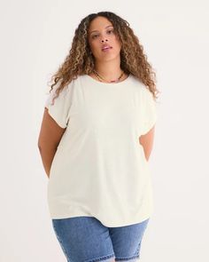 Elevate your summer wardrobe with this plus-size knit top. Featuring a textured knit finish, extended sleeves, and crisscross straps at back, it's the perfect blend of classic style, undeniable comfort, and modern twist. Pair with your favourite jeans or skirt for an effortlessly stylish outfit.  Features - Textured knit finish - Solid colour - Extended sleeves - Crewneck - Crisscross detail at back - Length: 28 in Addition Elle, Essential Dress, Stylish Outfit, Top Graphic Tees, Textured Knit, Fitted Sweater, Solid Colour, Boyfriend Fit, Pants Straight