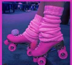 a person in pink roller skates with fuzzy socks