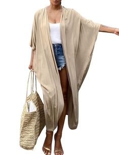 PRICES MAY VARY. One-size beach bathing suit cover up with a long design, flowy casual oversized loose fitting. Length: 50" Shoulder: 39" This open-front kimono cardigan features roomy sleeves, bohemian style, and irregular tie-dye striped printing that's chic and stylish. This kimono cover up is made of soft and comfortable fabric, lightweight, breathable, and easy to put on and take off, making it the perfect sunscreen. Be used as a casual cover up, over a simple undershirt or jeans in daily w Long Beach Cover Up, Gilet Kimono, Cardigan Kimono, Beach Kimono, Beach Bathing Suits, Summer Kimono, Summer Beach Outfit, Bathing Suit Cover Up, Black Tie Dye