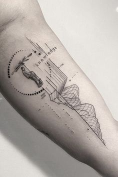 a man's arm with a line work tattoo on it