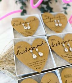 wedding favors in heart shaped boxes with names on them