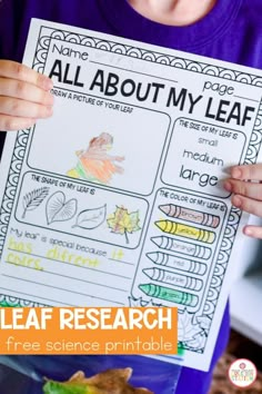 a young boy holding up a leaf research paper with the title, all about my leaf