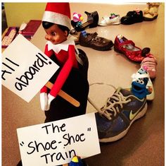 two elfs are holding signs that read, i'll appeal the shoe - shoc train