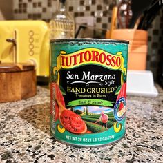 a can of tuna sauce sitting on top of a kitchen counter