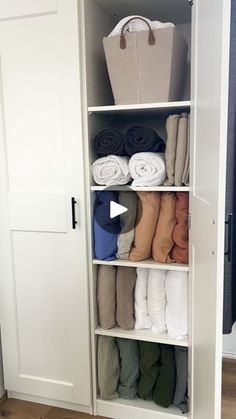 the closet is full of folded towels and blankets