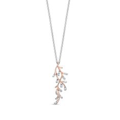 Elevate your look with the serene sea details of this diamond coral reef pendant from the Enchanted Disney Fine Jewelry Collection inspired by Disney's live-action film, The Little Mermaid. Created in precious 10K rose gold, these branching coral reef ribbons - each shimmering with diamonds - form an elegant crossover design along this linear double-row drop. Radiant with 1/10 ct. t.w. of diamonds. Email me at Gabrielle.Gruenloh@SignetJewelers.com for more! #ZalesEmployee Disney The Little Mermaid, Coral Necklace, Disney Jewelry, Action Film, Coral Reef