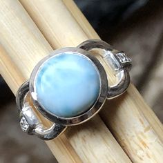 Handmade, natural product  Stone: Larimar  Metal: 925 Solid Sterling Silver Larimar is not only a rare and beautiful stone reminiscent of the clear blue waters that surround the area that it comes from in the Caribbean. Chakra Opening, Clear Blue Water, Emotional Strength, Engagement Ring Size, Silver Engagement Ring, The Throat Chakra, Sterling Silver Engagement Rings, Engagement Ring Sizes, Natural Rock