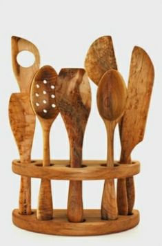 wooden utensils are arranged in a holder