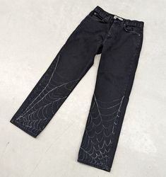 "1 of 1 Up-Cycled \"Spider Web\" black and white jeans Size: 30x30 Tag: forest.dweller11 These jeans are 1 of 1 and hand painted. Comes as is  Measurements are taken in the photos  Message for additional information on the piece or preferred shipping prices  All items ship within 1-3 business days of purchase  Items are preowned unless otherwise stated  Always happy to do discounts on bundles! Happy hunting!!" Black Jeans For Halloween Streetwear, Black Grunge Jeans For Halloween, Halloween Cotton Jeans For Streetwear, Halloween Streetwear Cotton Jeans, Halloween Straight Leg Cotton Bottoms, Halloween Cotton Straight Leg Bottoms, Straight Leg Cotton Bottoms For Halloween, Cotton Straight Leg Bottoms For Halloween, Jean Ideas