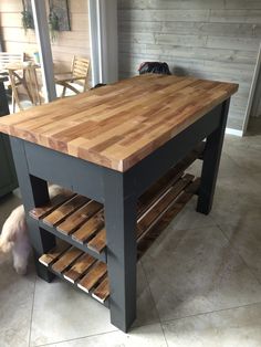 a kitchen island made out of wooden pallets