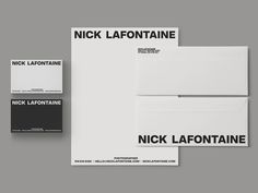 two envelopes with black and white letters on them next to an envelope that says nick lafontaine