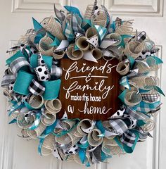 a wreath that says friends family make his house a home