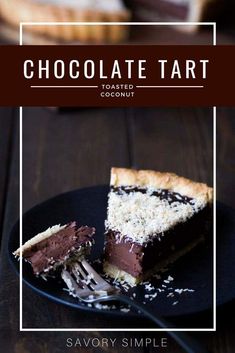 the chocolate tart is cut in half and served on a black plate with a fork